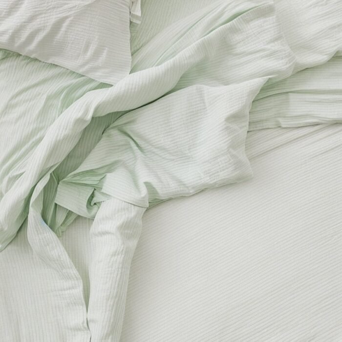 Lniane prześcieradło z obramowaniem - w paski paprociowe